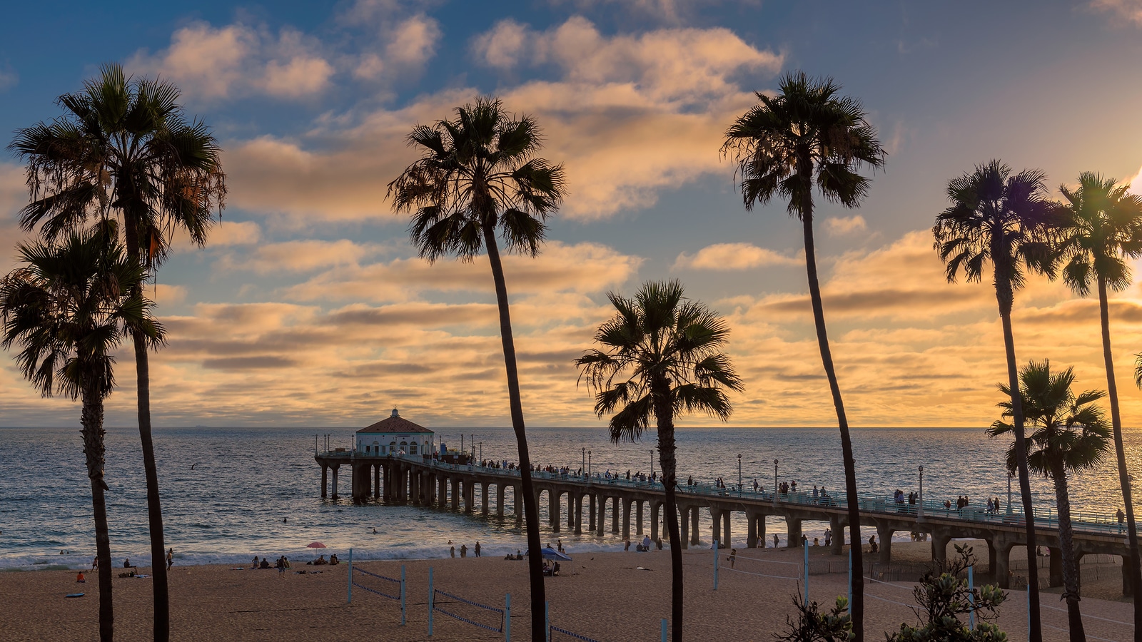 Beach at sunset in California by Booking Express Travel